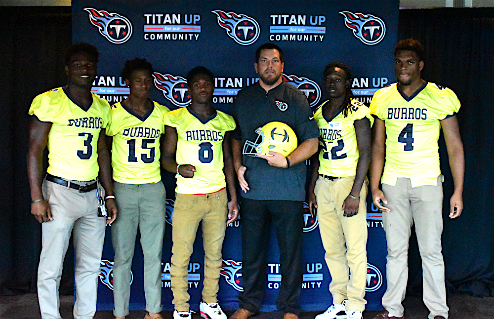 Josh+Corey%2C+center%2C+poses+with+key+Hillsboro+High+School+football+players+who+attend+the+2nd+Annual+Tennessee+Titans+High++School+Media+Day.+Corey+is+the+Outreach+Coordinator+for+the+Tennessee+Titans