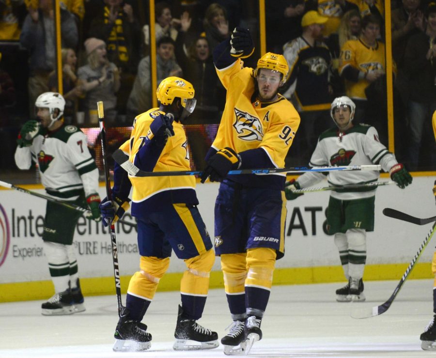 Nashville Predators defenseman P.K. Subban (76) and center Ryan Johansen (92) celebrate a goal by Subban in the third period of an NHL hockey game against the Minnesota Wild, Saturday, Dec. 30, 2017, in Nashville, Tenn. (AP Photo/Mike Strasinger)