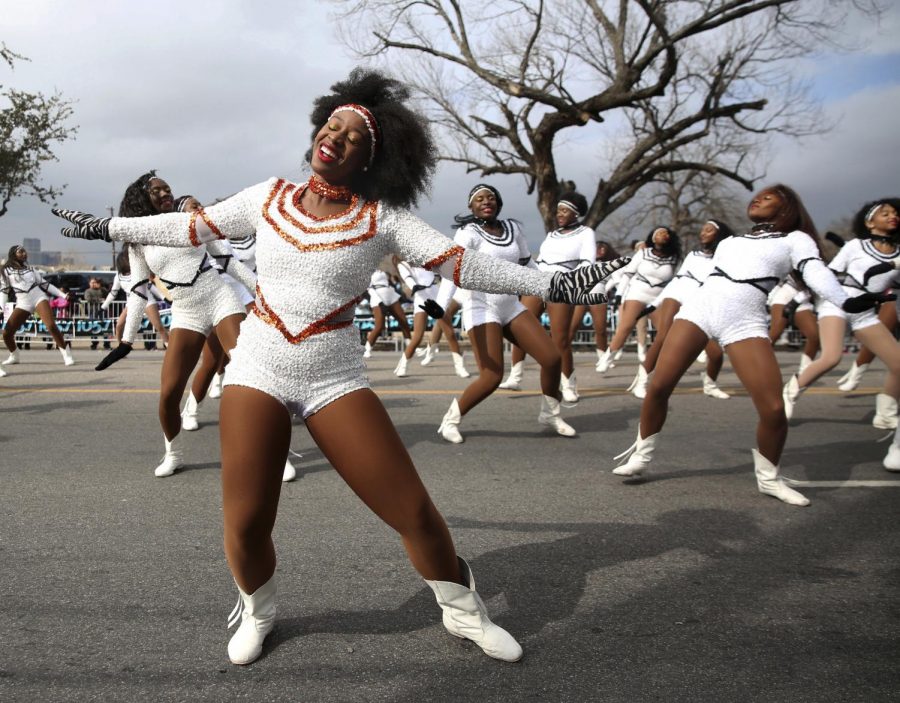 Tiara Falls, with the Lancaster High School Tigerettes, performs during the Martin Luther King, Jr. Parade on Martin Luther King, Jr. Day in Dallas on Monday, Jan. 15, 2018. (Rose Baca/The Dallas Morning News via AP)