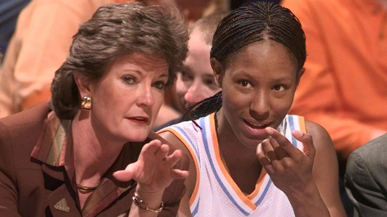 Tennessee head coach Pat Summitt talks with Chamique Holdsclaw on the bench as Holdsclaw ices her knees in the final minutes of their game against Florida at the SEC women’s tournament in Chattanooga, Tenn. on Friday, Feb. 26, 1999. Tennessee defeated Florida, 92-80, to advance to the semifinal round of the tournament. (AP Photo/Mark Humphrey)
