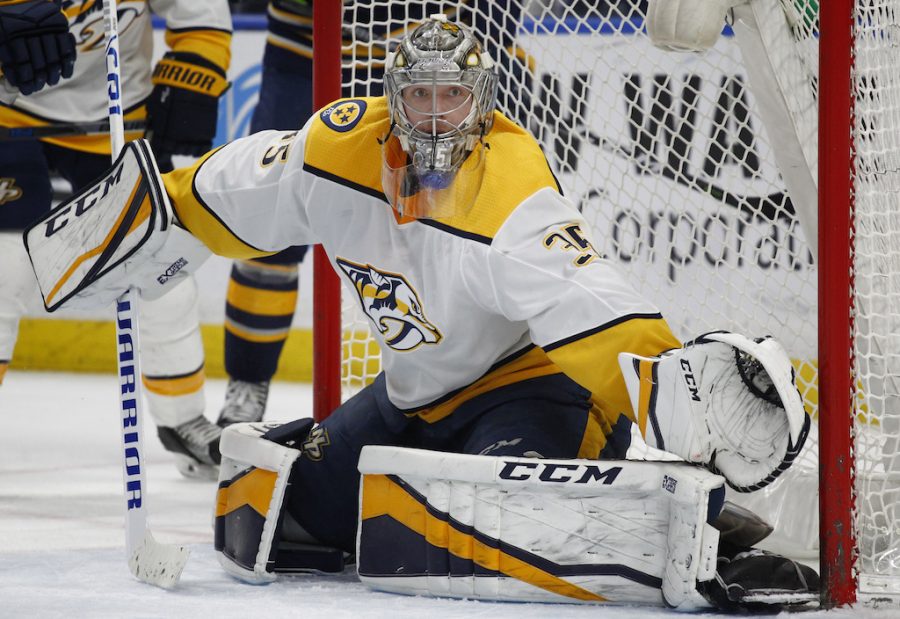 Nashville Predators goalie Pekka Rinne (35) watches the puck during the third period of an NHL hockey game against the Buffalo Sabres Monday, March 19, 2018, in Buffalo, N.Y. (AP Photo/Jeffrey T. Barnes)