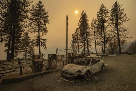 California wildfire has killed 79, rain is helming squelch fires but mudslides present recovery problems