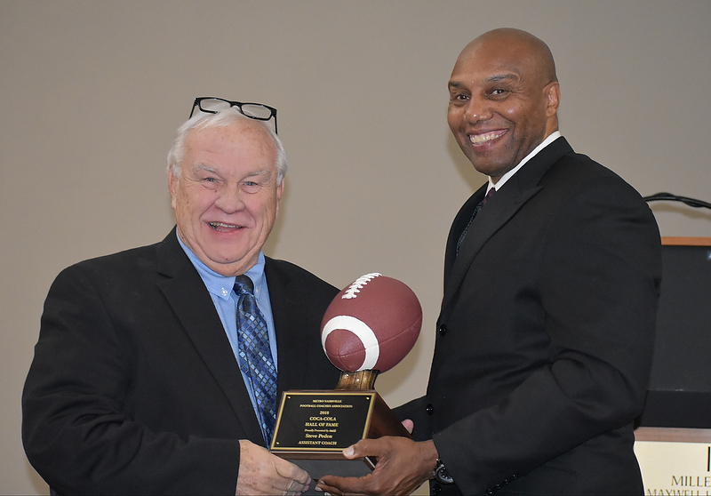 Steve Peden presented the Hall of Fame induction trophy by Roosevelt Sanders at the Coaches Hall of Fame dinner held at the Maxwell House Hotel 12.7.18