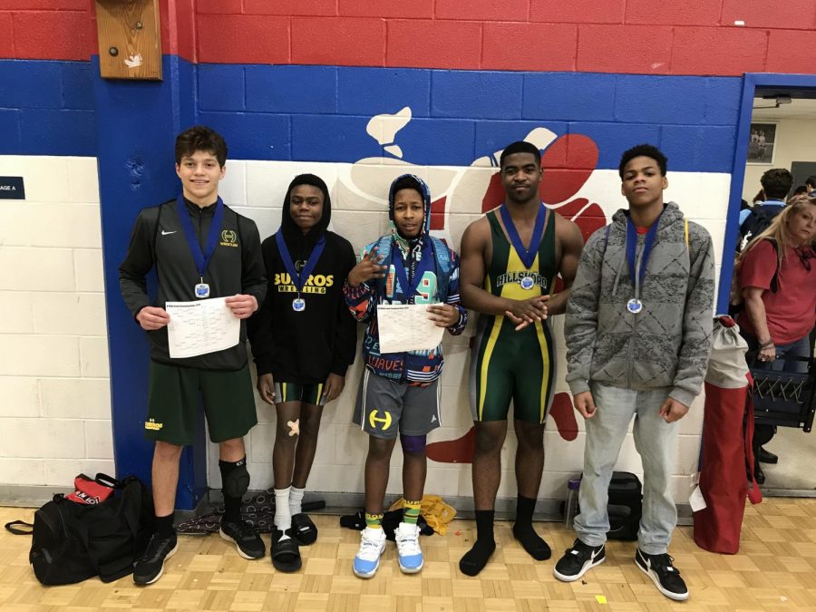 L-R+Wrestlers+Cooper+Sacks+%281st+place%29%2C+Christian+Brown+%283rd%29%3B+Tahj+Jackson+%281st%29%3B+Maikel+Holloway+2nd%29+at+the+MTWOA+Grand+Championship+Wrestling+tournament+for+Freshmen%2C+Women+and+JV.+