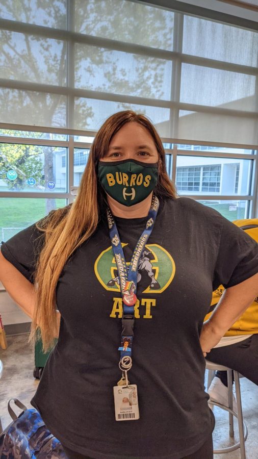 Visual Arts Teacher, Sara Hyatt, is representing Hillsboro in her classroom with her Spirit Wear. She's proud to represent Hillsboro and its art program. Picture of Sara Hyatt by Joshua R. Miller on August 27, 2021, in room 1224.