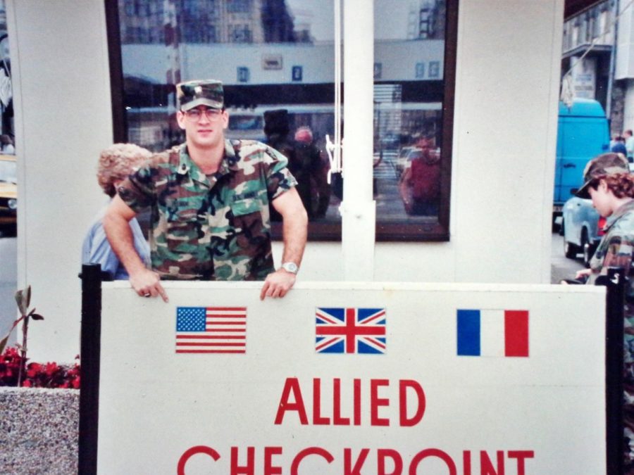 Dr. Shuler Pelham, Executive Principal of Hillsboro High School while stationed at Checkpoint Charlie in  the Berlin, Germany. Dr. Pelham served in the Army military Intelligence in 1989 when the Berlin Wall was torn down. Picture submitted by Shuler Pelham.