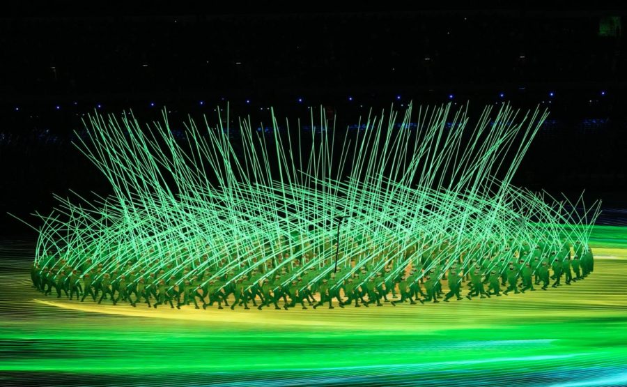 Performers+wave+light+sticks+during+the+opening+ceremony+of+the+2022+Winter+Olympics%2C+Friday%2C+Feb.+4%2C+2022%2C+in+Beijing.+%28AP+Photo%2FBernat+Armangue%29