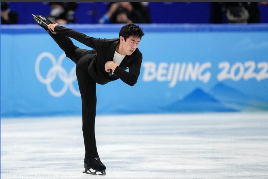 Nathan Chen, of the United States, competes during the mens singles short program team event in the figure skating competition at the 2022 Winter Olympics, Friday, Feb. 4, 2022, in Beijing. (AP Photo/Jeff Roberson)
