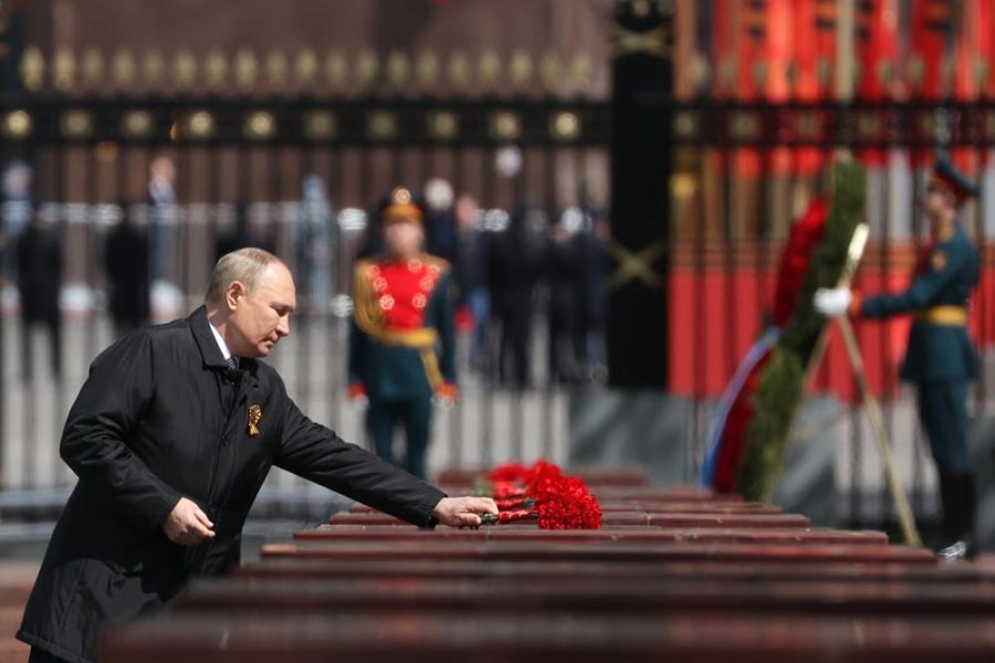 Russian President Vladimir Putin attends a wreath-laying ceremony at the Tomb of the Unknown Soldier after the
military parade marking the 77th anniversary of the end of World War Il in Moscow, Russia, Monday, May 9,
2022. (Anton Novoderezhkin, Sputnik, Kremlin Pool Photo via AP)