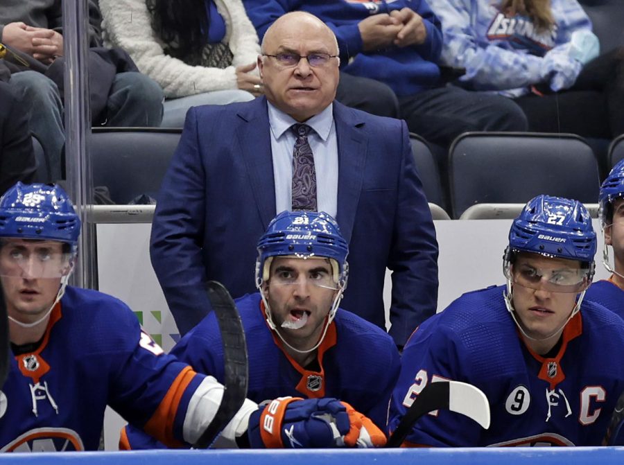 FILE+-+New+York+Islanders+head+coach+Barry+Trotz%2C+top%2C+looks+on+during+the+third+period+of+an+NHL+hockey+game+against+the+Minnesota+Wild+on+Jan.+30%2C+2022%2C+in+Elmont%2C+N.Y.+The+Nashville+Predators+announced+Sunday%2C+Feb.+26%2C+2023%2C+that+Trotz+is+rejoining+the+team+in+their+front+office%2C+succeeding+David+Poile%2C+who+has+been+the+only+general+manager+in+the+NHL+franchises+history.+%28AP+Photo%2FAdam+Hunger%2C+File%29