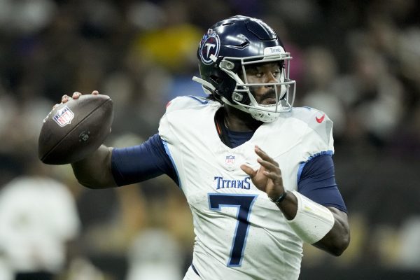 Tennessee Titans quarterback Malik Willis passes against the New Orleans Saints during the second half of an NFL preseason football game, Sunday, Aug. 25, 2024, in New Orleans. (AP Photo/Gerald Herbert)