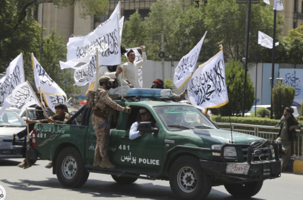 Taliban fighters celebrate the third anniversary of the withdrawal of US-led troops from Afghanistan, in Kabul, Afghanistan, Wednesday, Aug. 14, 2024. (AP Photo/Siddiqullah Alizai)