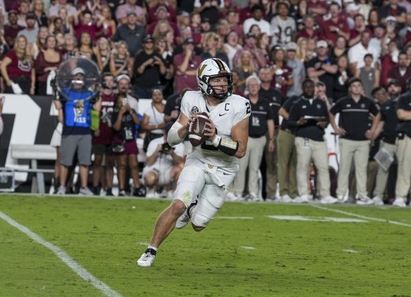 Vanderbilt quarterback Diego Pavia runs the ball against South Carolina during the first half of an NCAA college football game Saturday, Sept. 13, 2025, in Columbia, S.C. (AP Photo/David Yeazell)
