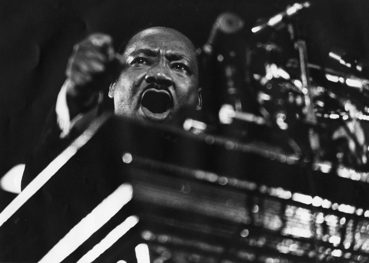 Dr Martin Luther King giving a sermon at a church February 1968