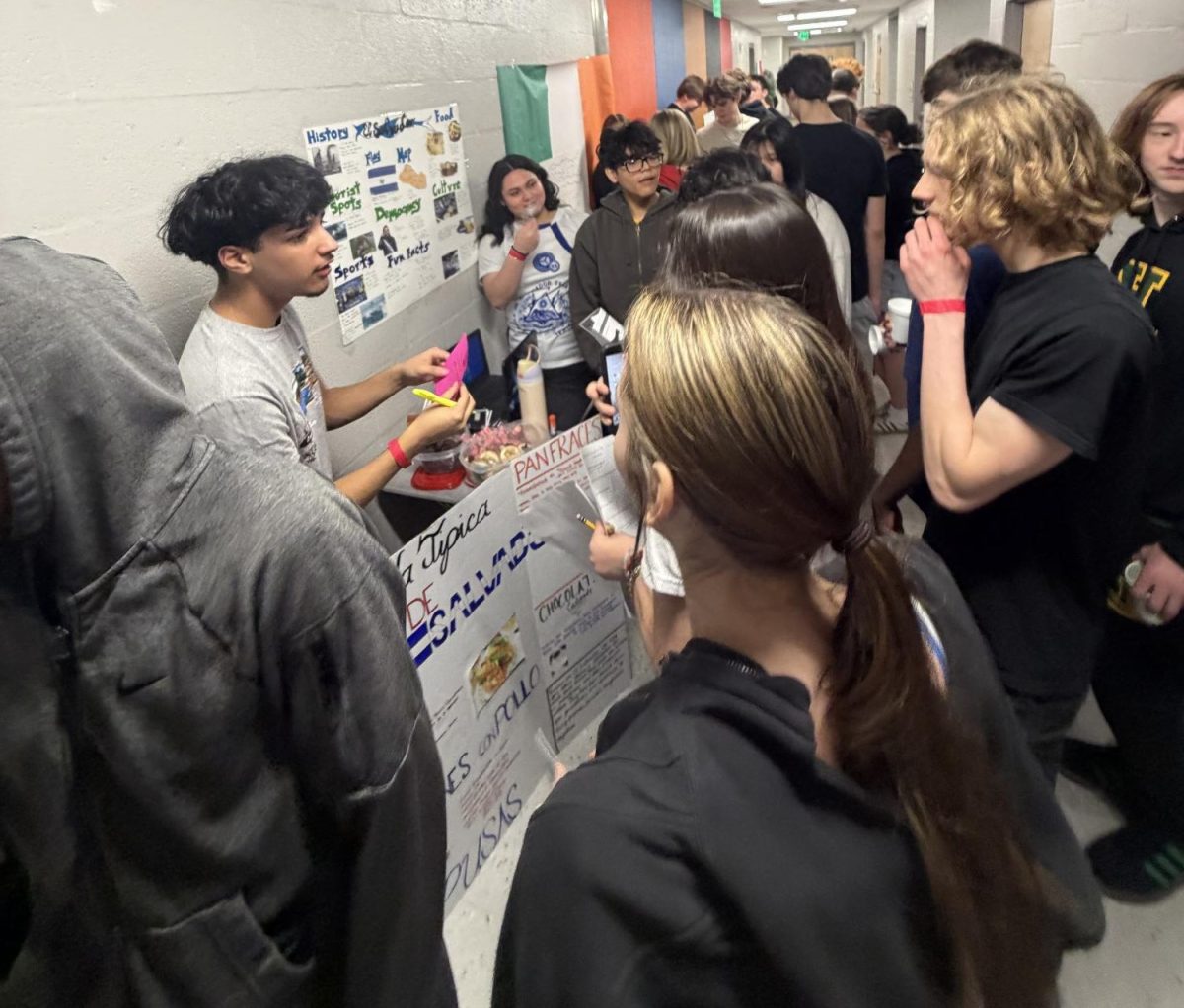 Students circled around learning El Salvador