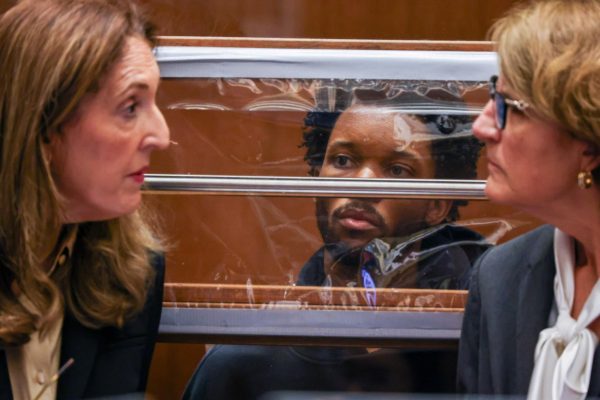 David Anthony Burke, whose stage name is D4vd, center, is arraigned Monday, April 20, 2026, in Los Angeles on charges of killing a 14-year-old girl whose dismembered body was found in his car. (Ted Soqui/Pool Photo via AP)